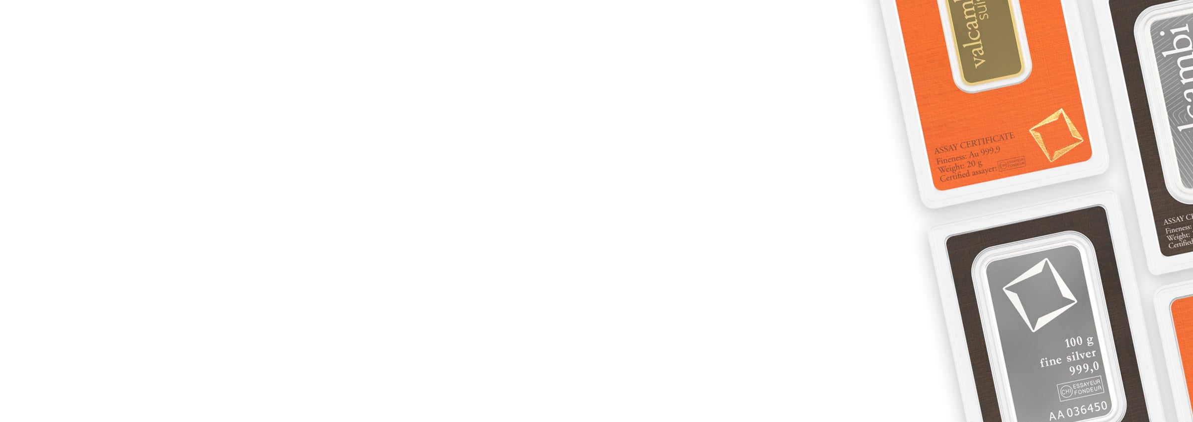 Valcambi gold and silver bars displayed on a white background